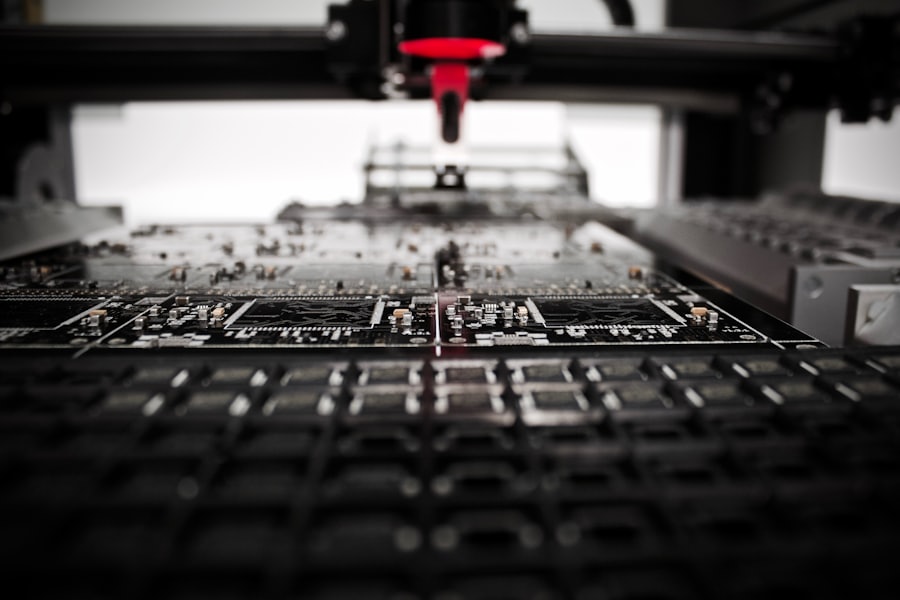 Pick-and-place head above a panel of boards on an assembly machine
